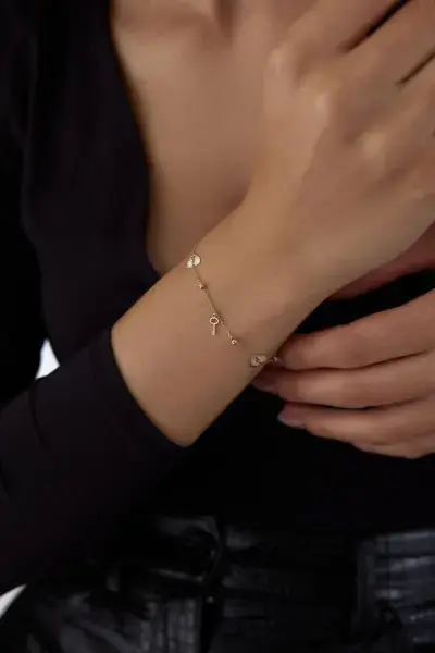 ALTIN SALLANTILI KALP-ANAHTAR BİLEKLİK