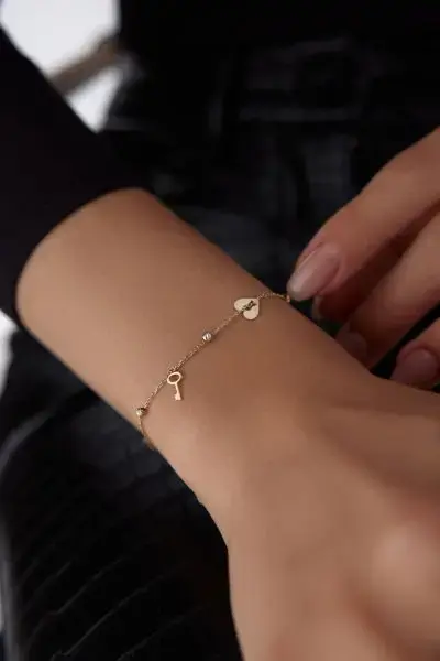 ALTIN SALLANTILI KALP-ANAHTAR BİLEKLİK