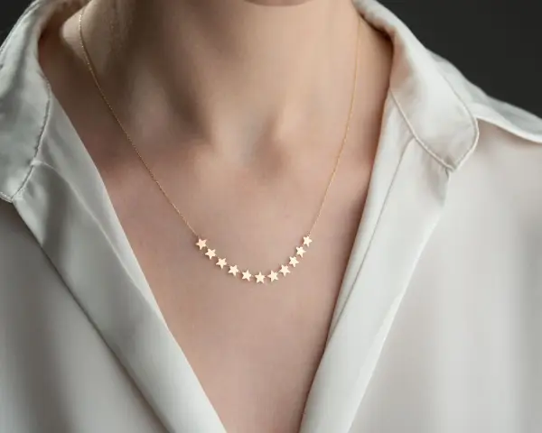 ALTIN SIRALI YILDIZ KOLYE