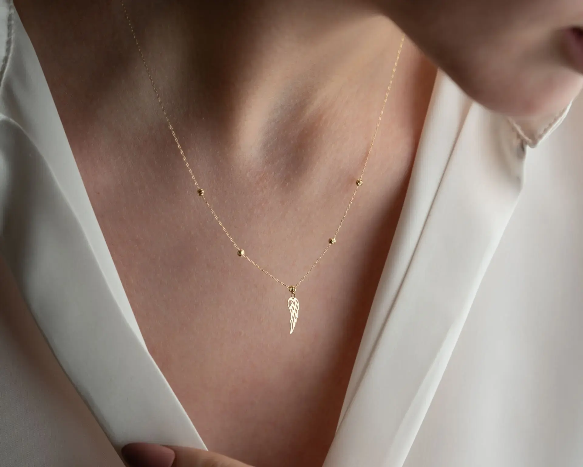 ALTIN DORİKALI KANAT KOLYE