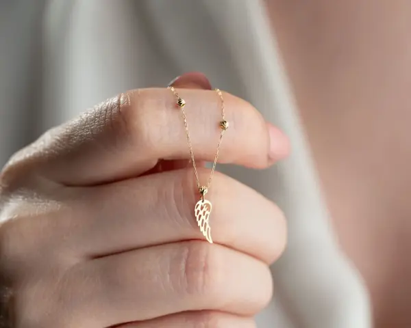 ALTIN DORİKALI KANAT KOLYE