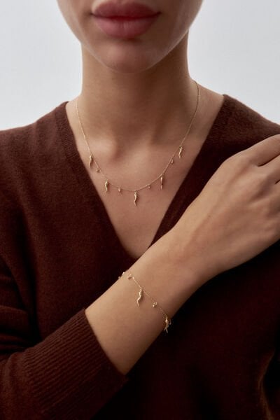 Altın Sallantılı Biber Figürlü Set